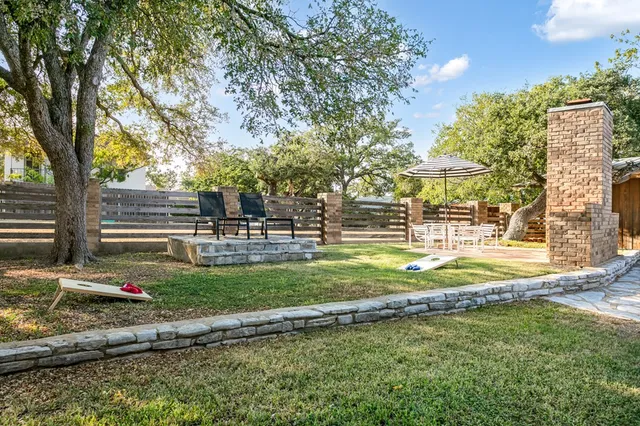 a view of a chairs and tables in the patio