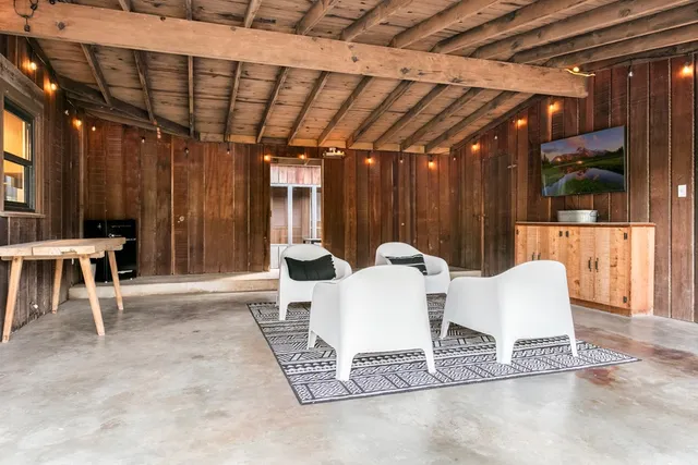 a kitchen with stainless steel appliances granite countertop a stove and a microwave