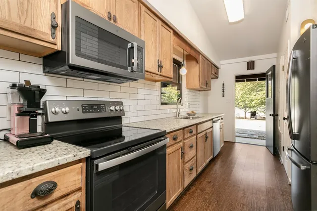 a bathroom with a bathtub and shower