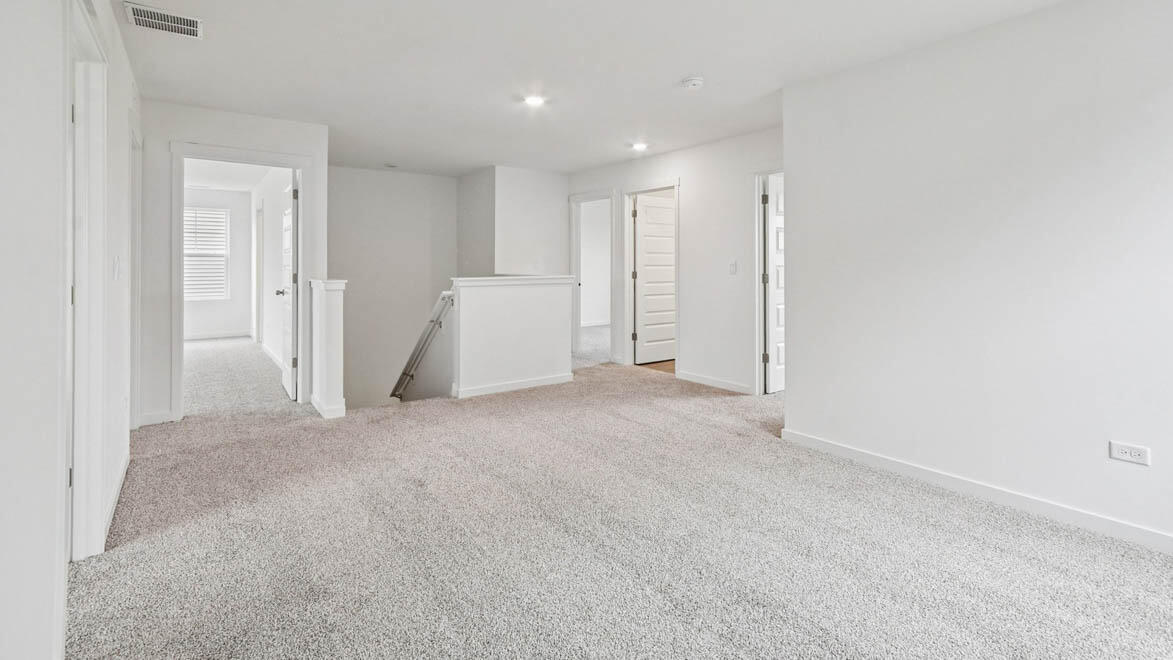 7694 West 107th Place Crown Point, IN 46307 - Photo 23 of 37 a view of an empty room