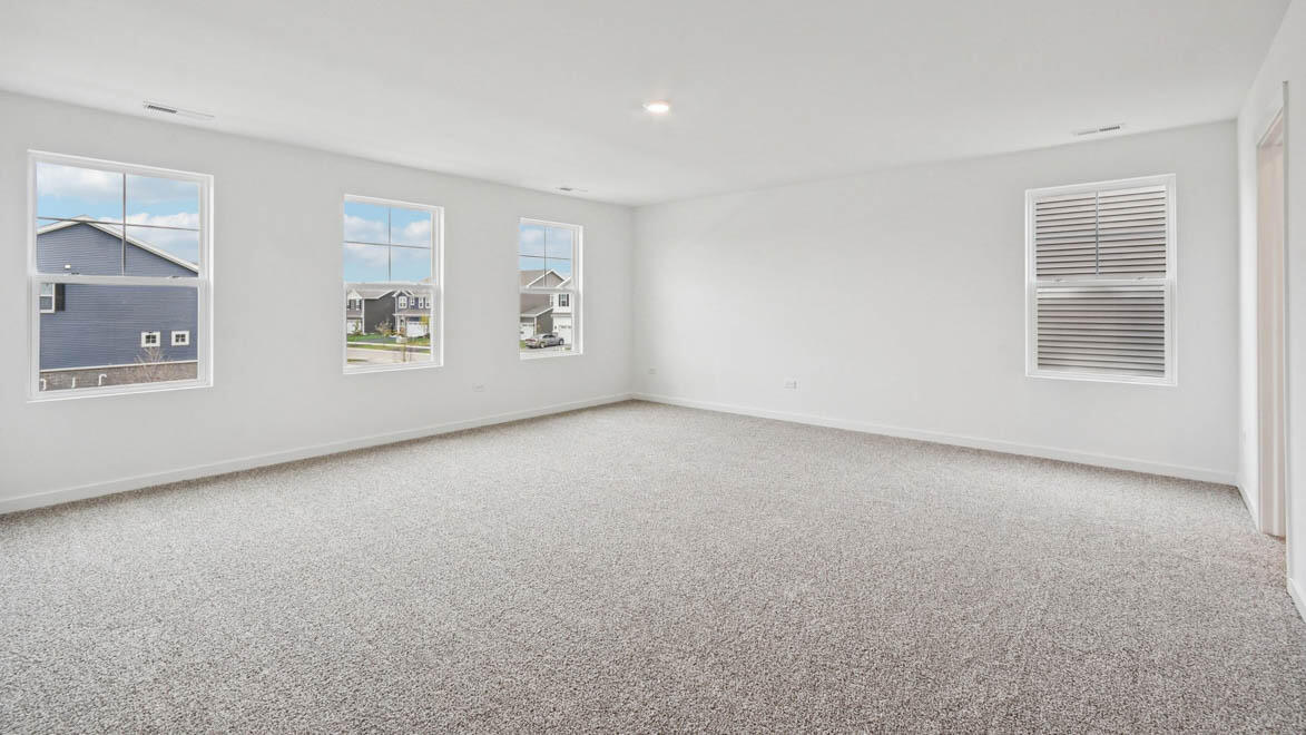 7694 West 107th Place Crown Point, IN 46307 - Photo 24 of 37 an empty room with windows