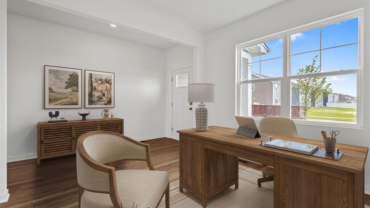 7694 West 107th Place Crown Point, IN 46307 - Photo 3 of 37 a dining room with furniture and window