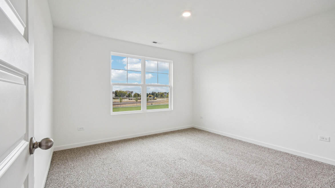 7694 West 107th Place Crown Point, IN 46307 - Photo 33 of 37 an empty room with a window