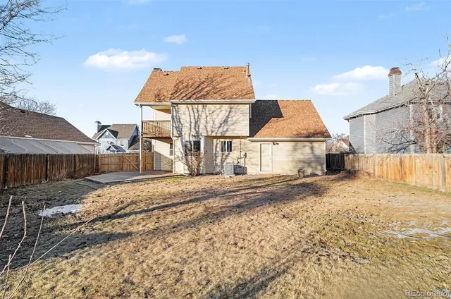 a view of a house with a snow on the road