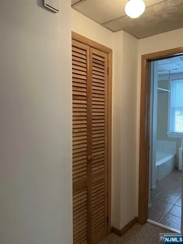 a view of bathroom with a window