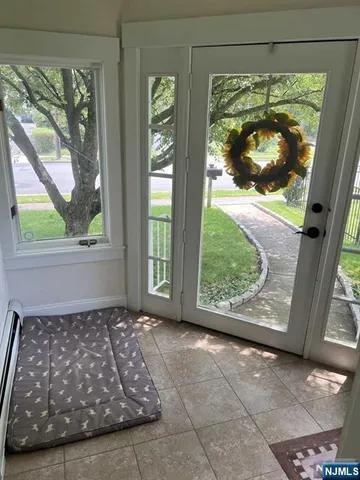 a view of a room with a large window