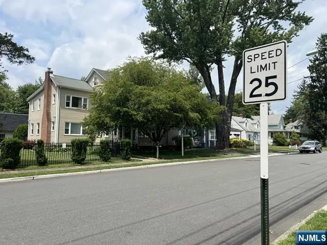 front view of a house with a street