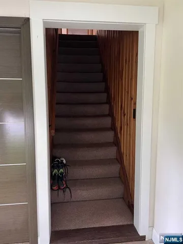 a view of entryway with stairs