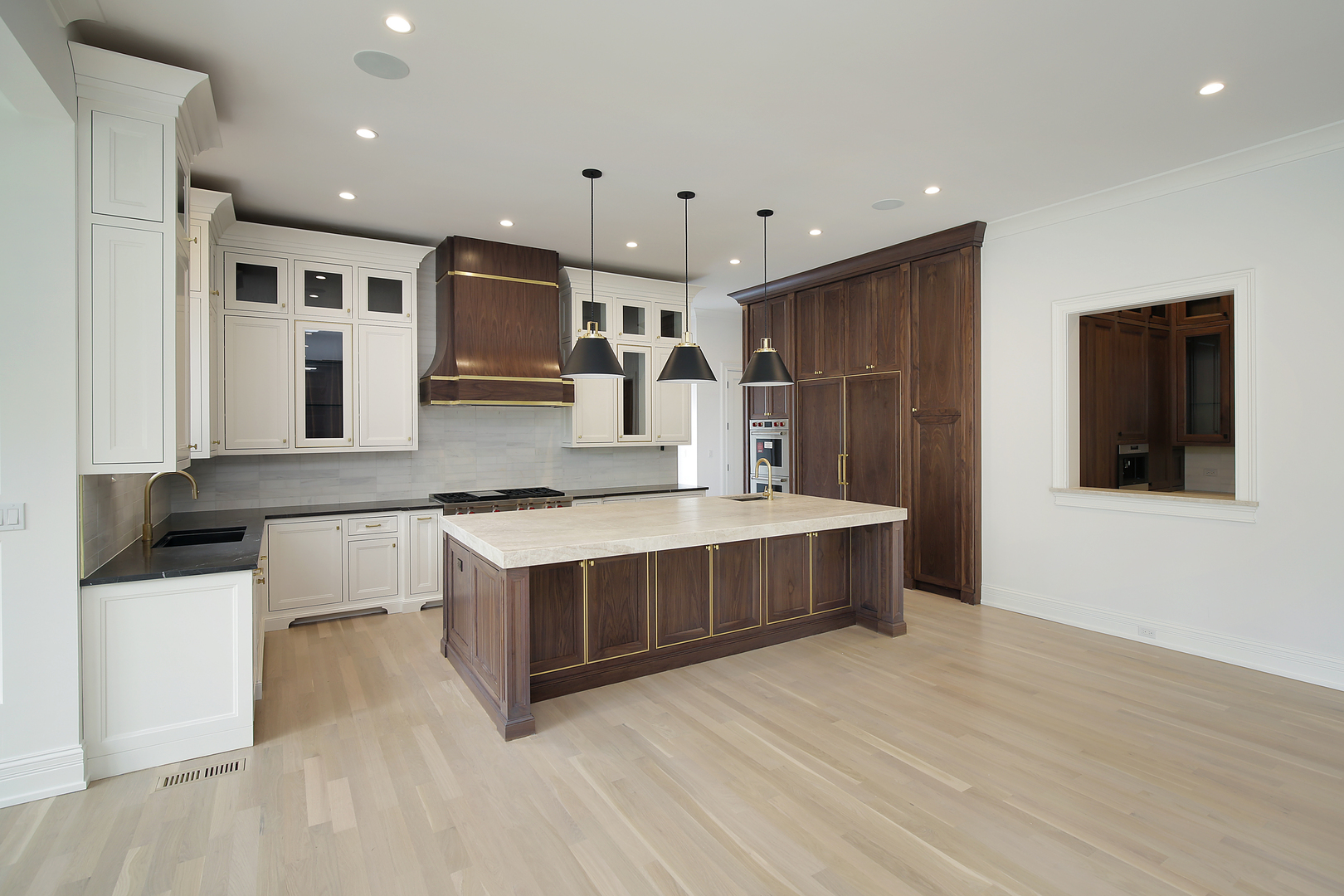 320 Princeton Road Hinsdale, IL 60521 - Photo 5 of 20 a large kitchen with stainless steel appliances granite countertop a large counter top and oven