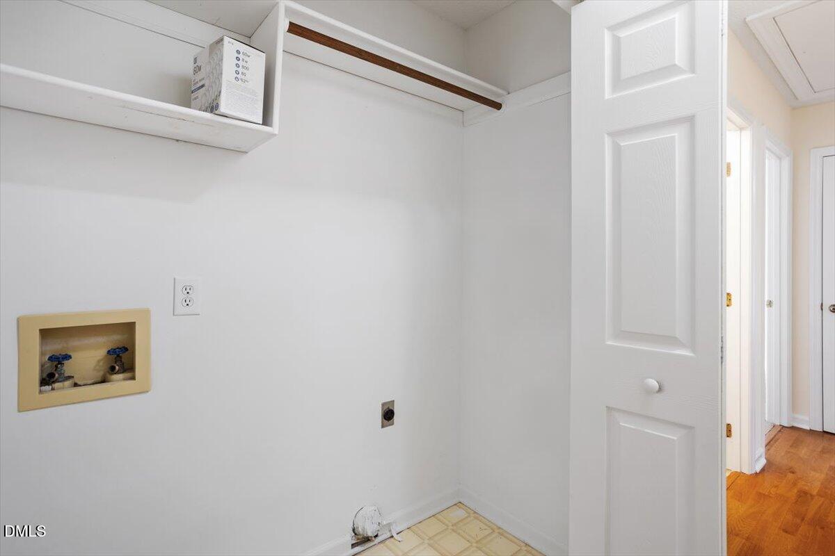 4208 Bluewing Road Raleigh, NC 27616 - Photo 13 of 21 Laundry Closet