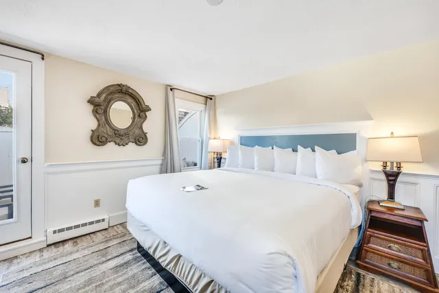 a outdoor living room with furniture and flowers