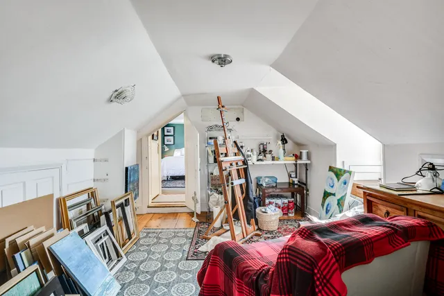 an aerial view of a house with a ocean view