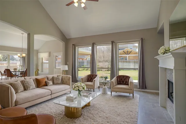a view of empty room with a fan