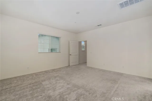 a bathroom with a sink double vanity and a mirror