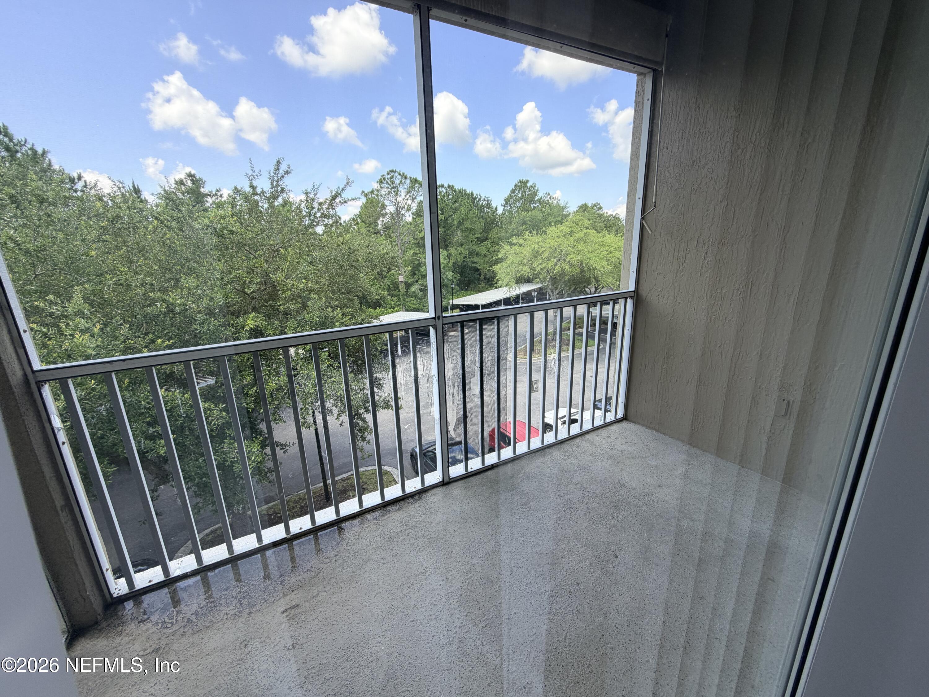 7990 Baymeadows Road East, Unit 1111 Jacksonville, FL 32256 - Photo 16 of 25 screened balcony