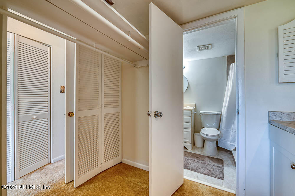 2321 Costa Verde Boulevard, Unit 201 Jacksonville Beach, FL 32250 - Photo 22 of 33 a view of a bathroom from a room