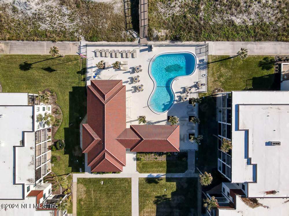 2321 Costa Verde Boulevard, Unit 201 Jacksonville Beach, FL 32250 - Photo 30 of 33 an aerial view of houses with outdoor space