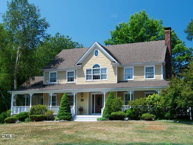 695 Ridgebury Road Ridgefield, CT 06877 - Photo 1 of 1 a house view with a garden space