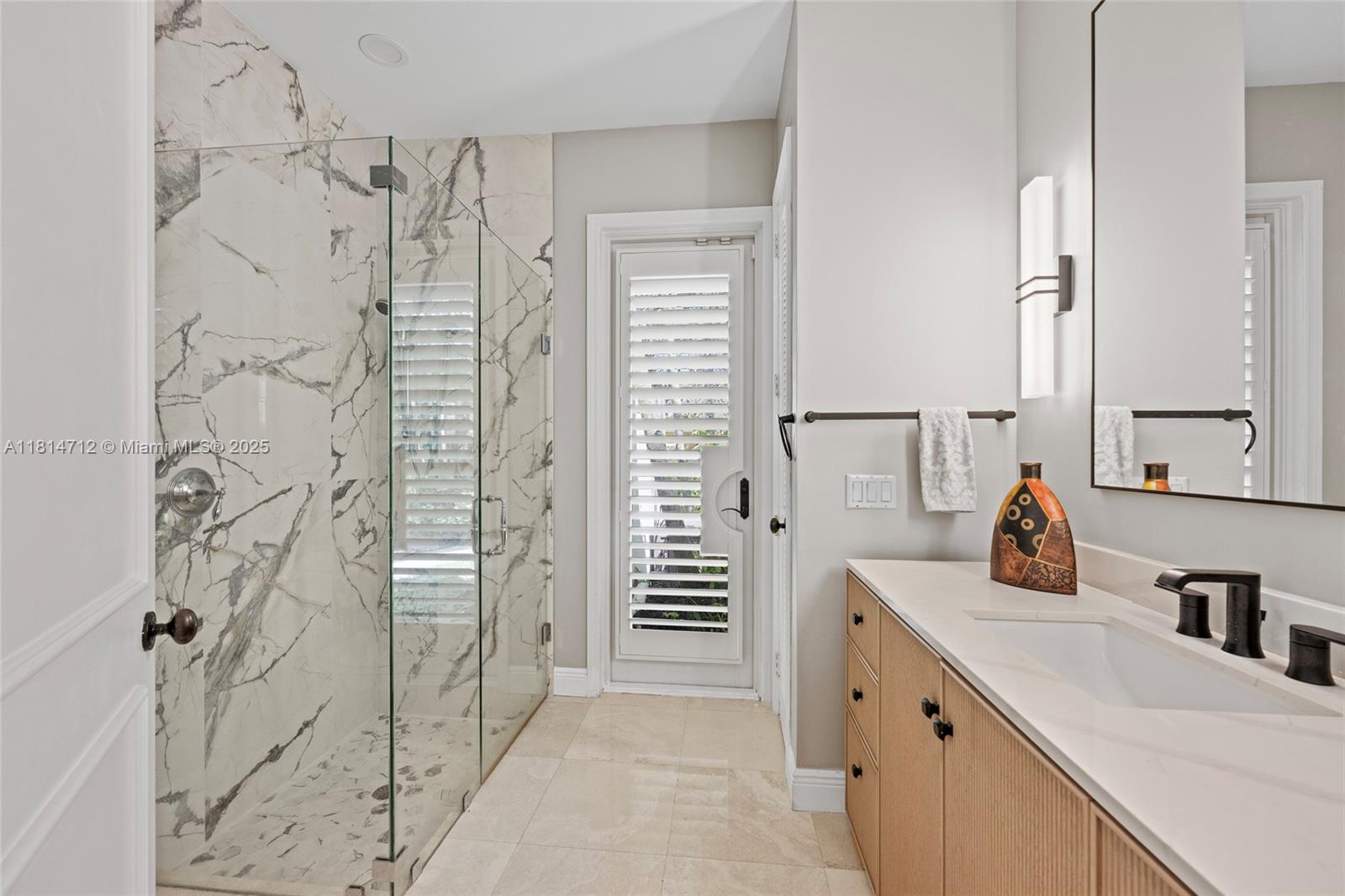 2805 Hackney Road Weston, FL 33331 - Photo 20 of 39 a kitchen with a refrigerator and a sink