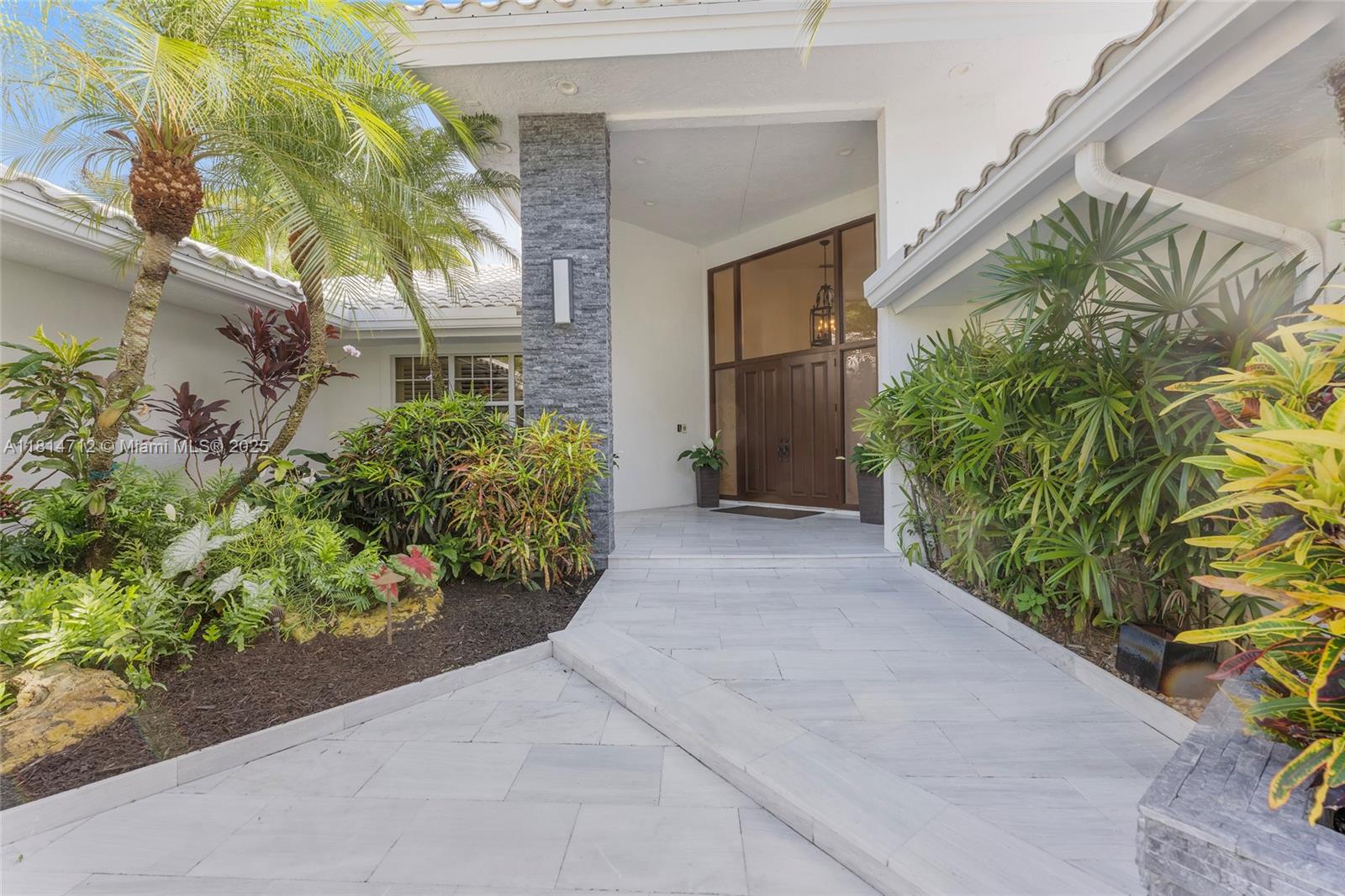 2805 Hackney Road Weston, FL 33331 - Photo 23 of 39 a view of a garden with pathway