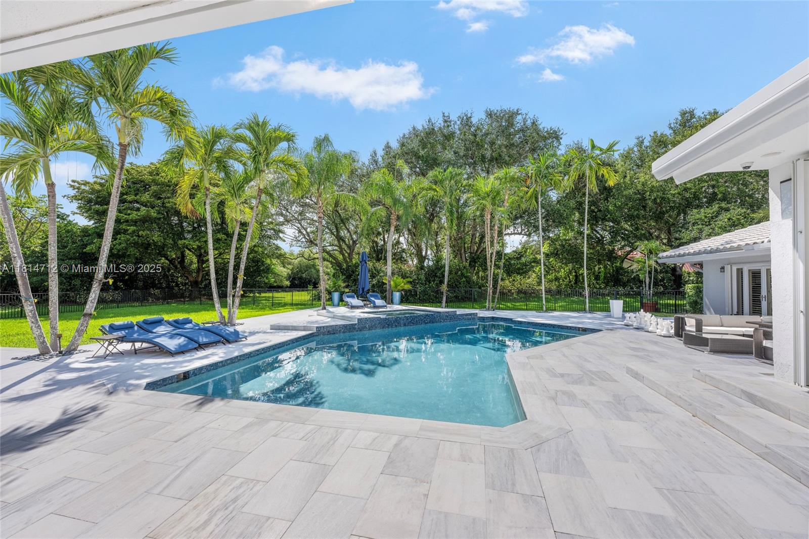 2805 Hackney Road Weston, FL 33331 - Photo 24 of 39 a view of a swimming pool with a patio