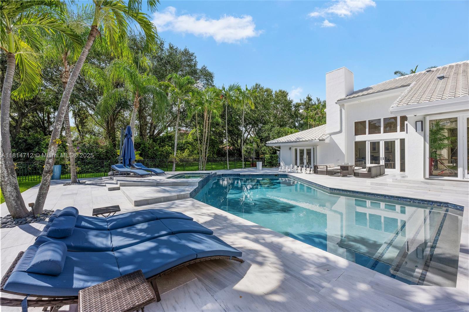 2805 Hackney Road Weston, FL 33331 - Photo 26 of 39 a view of a house with backyard and sitting area