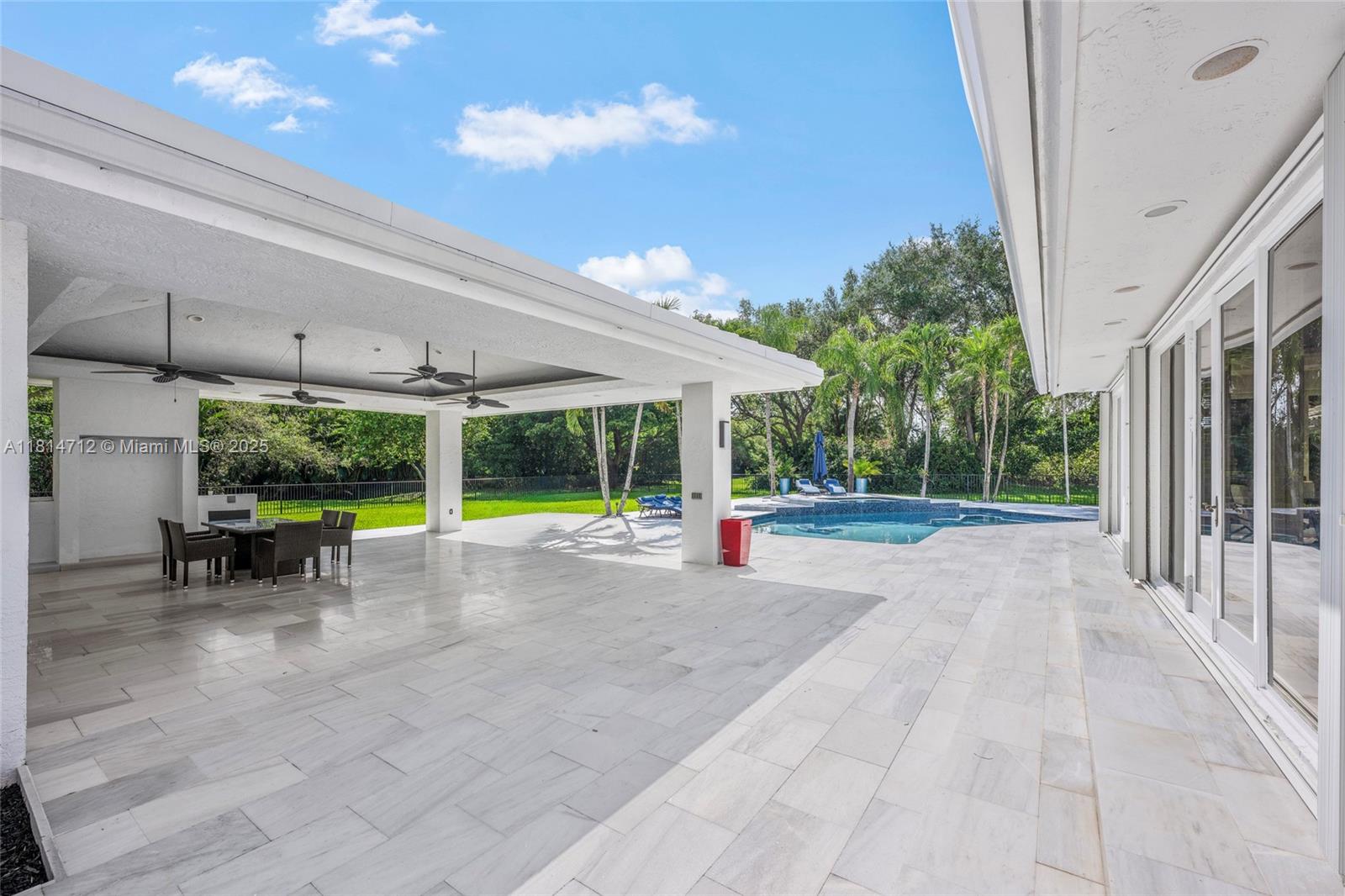 2805 Hackney Road Weston, FL 33331 - Photo 30 of 39 a view of a house with porch and garden