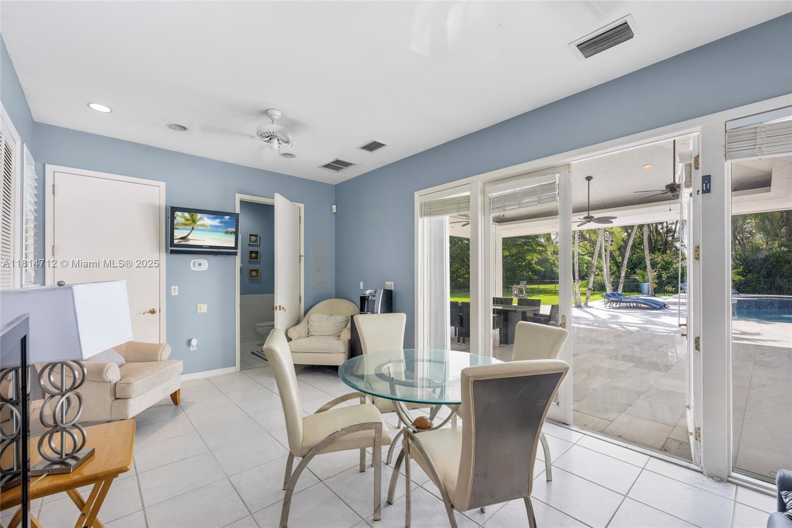 2805 Hackney Road Weston, FL 33331 - Photo 31 of 39 a living room with furniture and large windows
