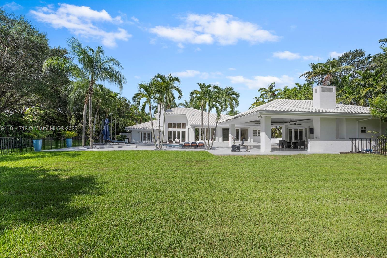 2805 Hackney Road Weston, FL 33331 - Photo 32 of 39 a front view of a house with garden