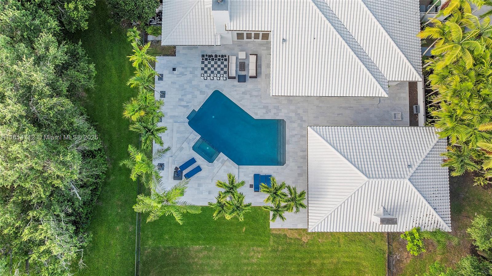 2805 Hackney Road Weston, FL 33331 - Photo 36 of 39 an aerial view of a house with a yard and sitting area