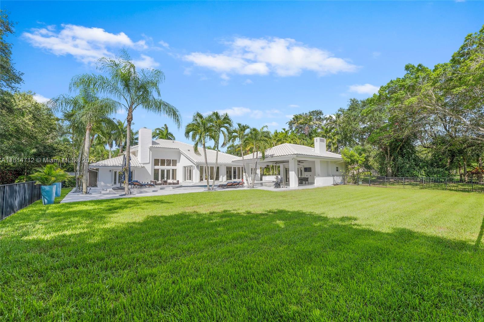2805 Hackney Road Weston, FL 33331 - Photo 37 of 39 a front view of a house with a garden