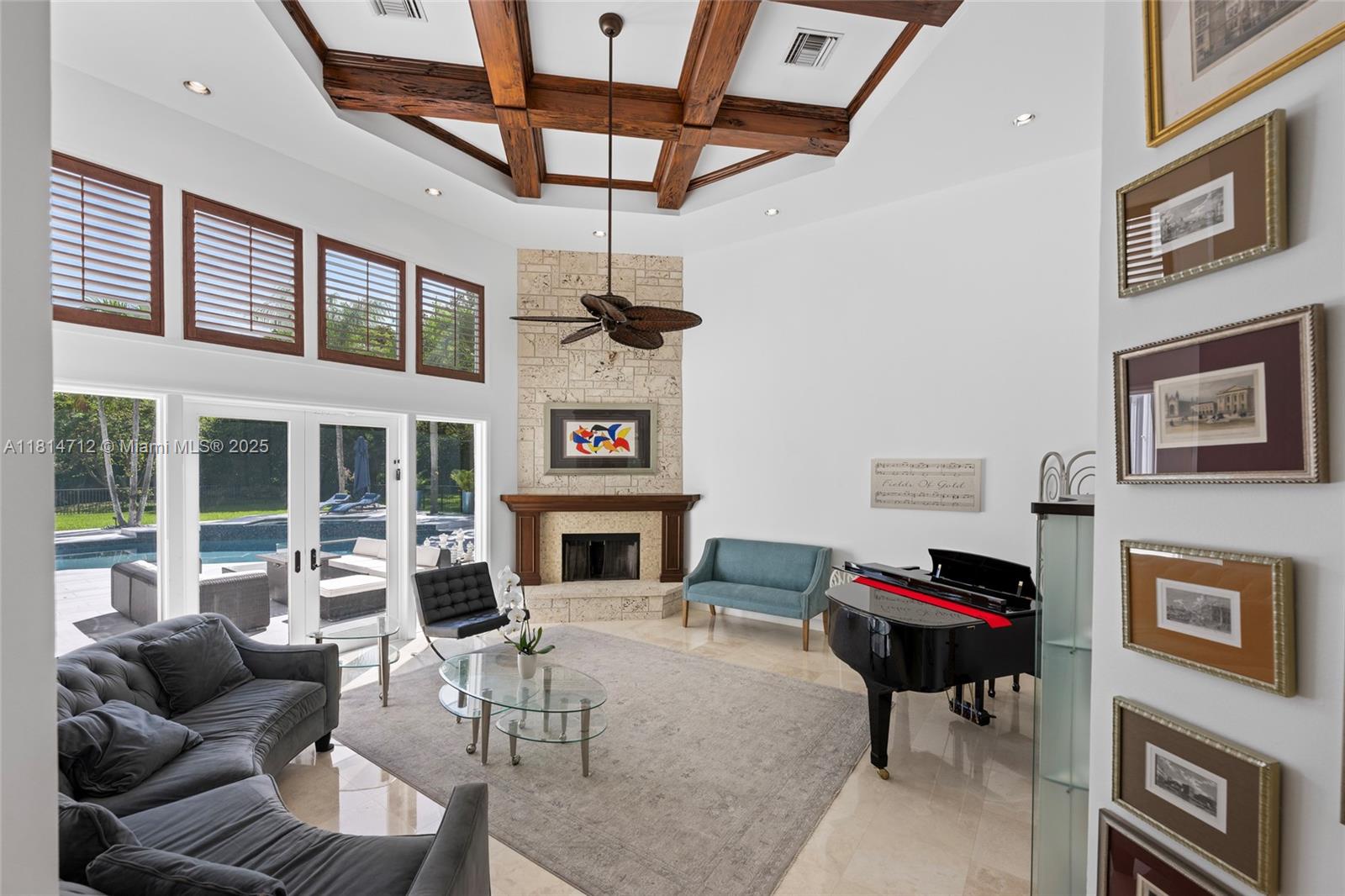 2805 Hackney Road Weston, FL 33331 - Photo 6 of 39 a living room with furniture and a fireplace