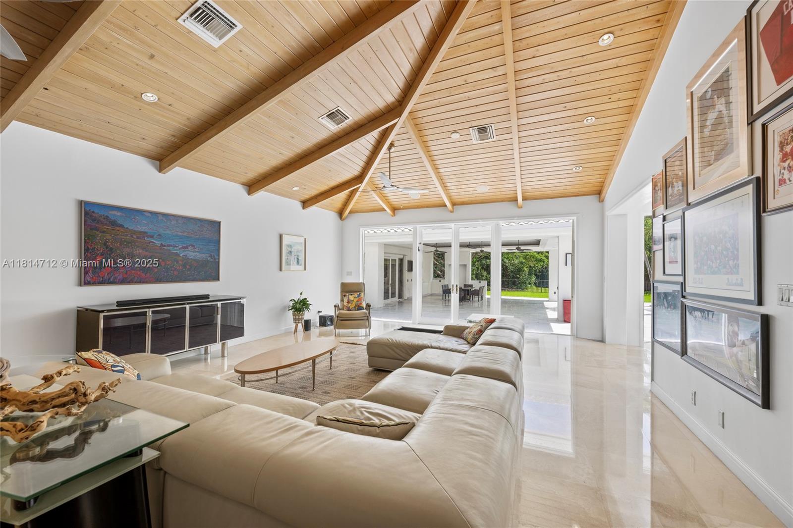 2805 Hackney Road Weston, FL 33331 - Photo 8 of 39 a living room with furniture and a large window