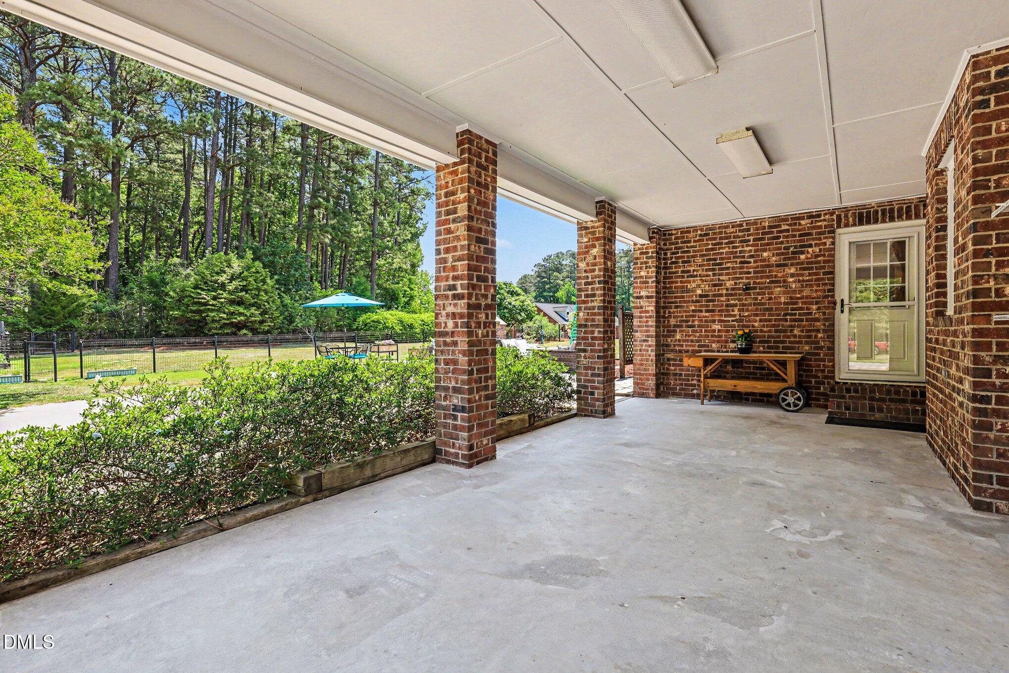 2256 Shotwell Road Clayton, NC 27520 - Photo 46 of 74 Attached Carport