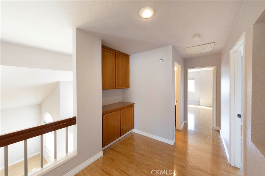 2 Bernini Irvine, CA 92614 - Photo 19 of 30 Open second floor leading to bedroom and baths with additional built-in storage throughout.
