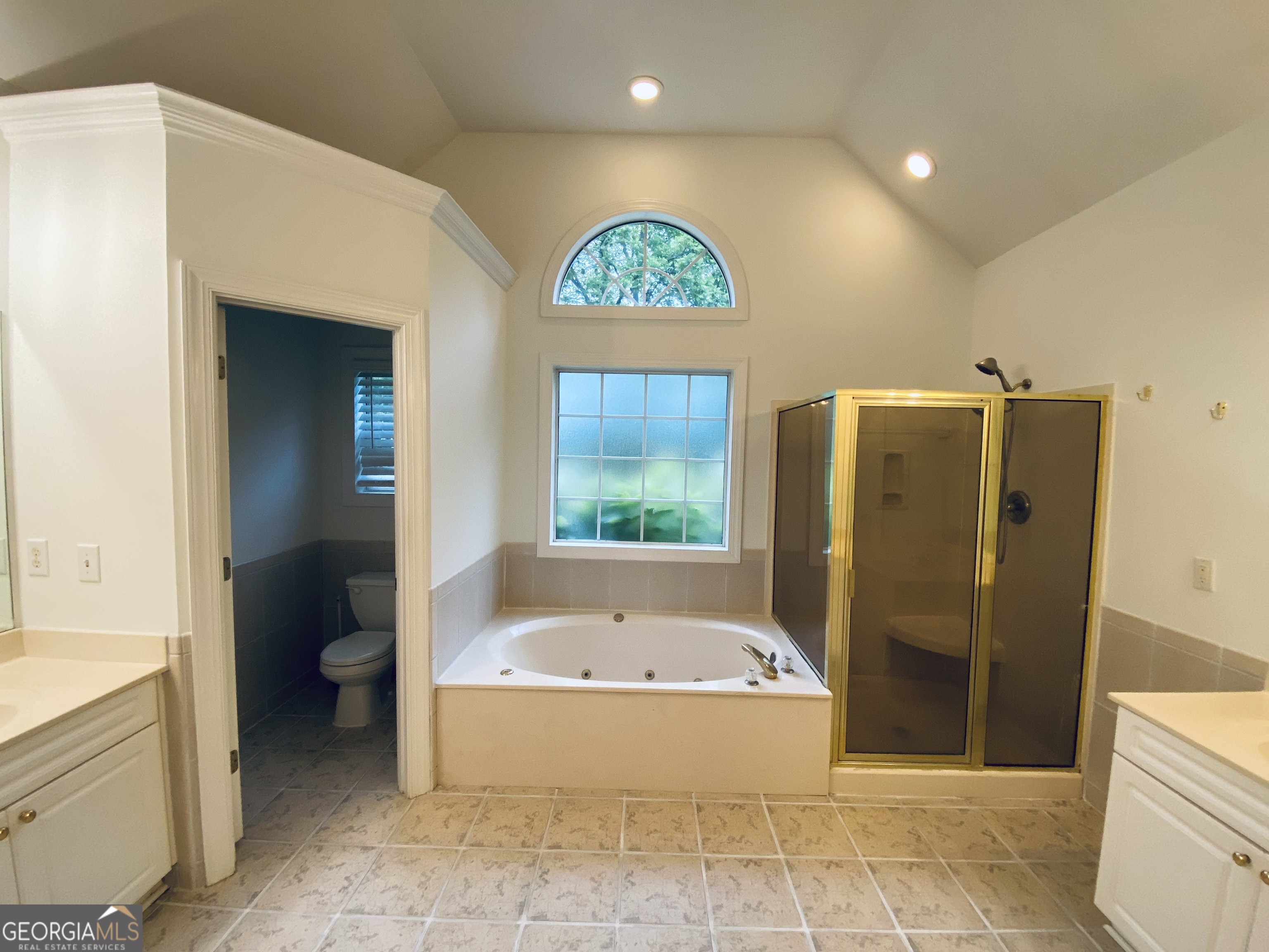 209 Trellis Walk Centerville, GA 31028 - Photo 26 of 38 a bathroom with a tub shower and toilet