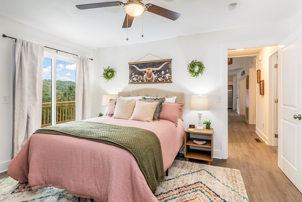 587 Oak Trace East Jasper, GA 30143 - Photo 13 of 47 a bedroom with a bed and a window