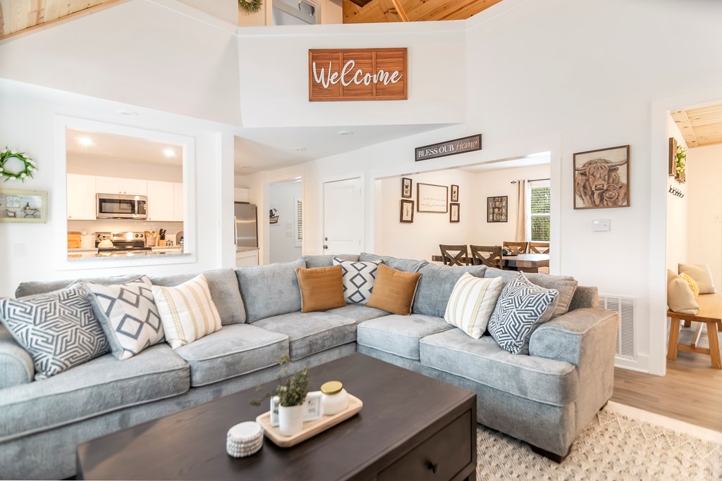 587 Oak Trace East Jasper, GA 30143 - Photo 15 of 47 a living room with furniture kitchen and a couch