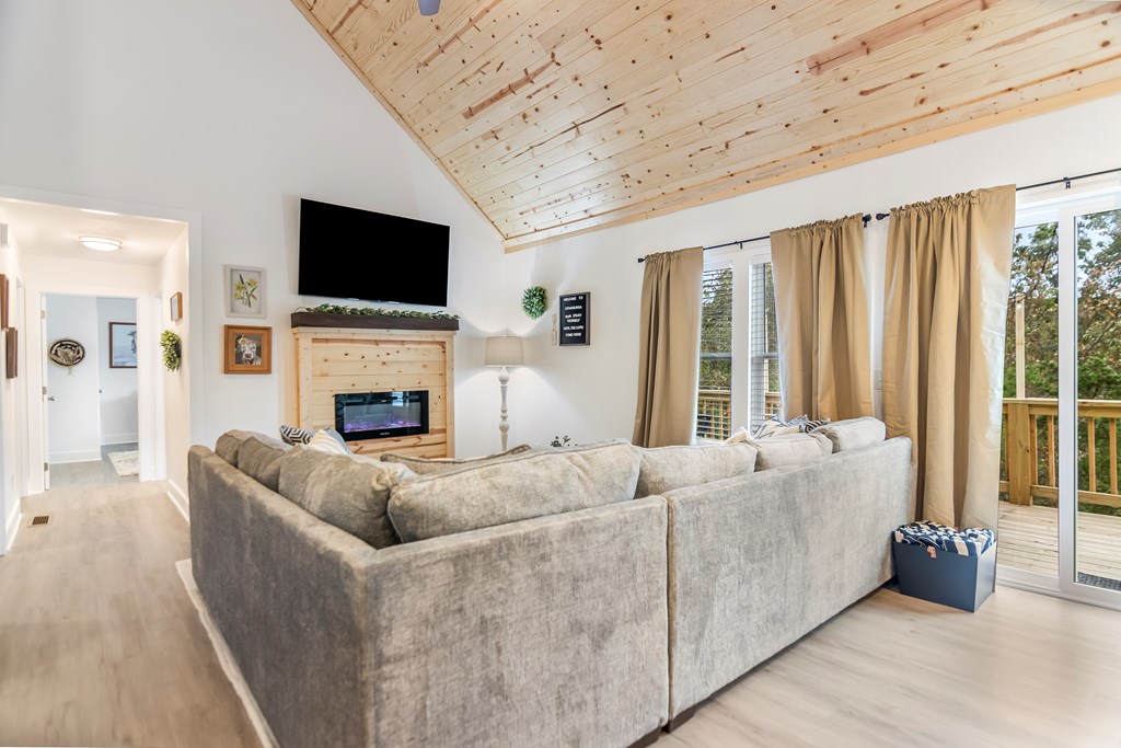 587 Oak Trace East Jasper, GA 30143 - Photo 16 of 47 a living room with furniture fireplace and flat screen tv