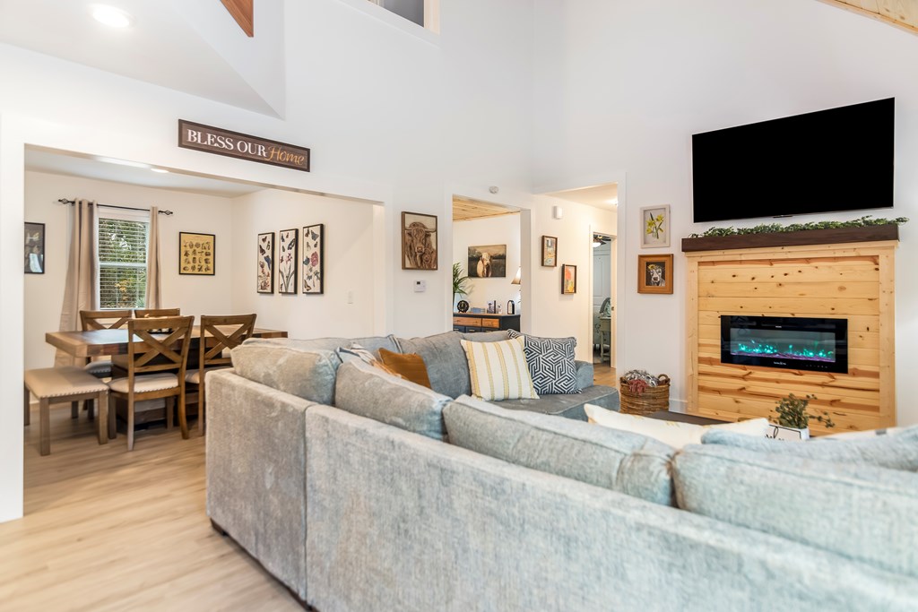 587 Oak Trace East Jasper, GA 30143 - Photo 17 of 47 a living room with fireplace furniture and a flat screen tv