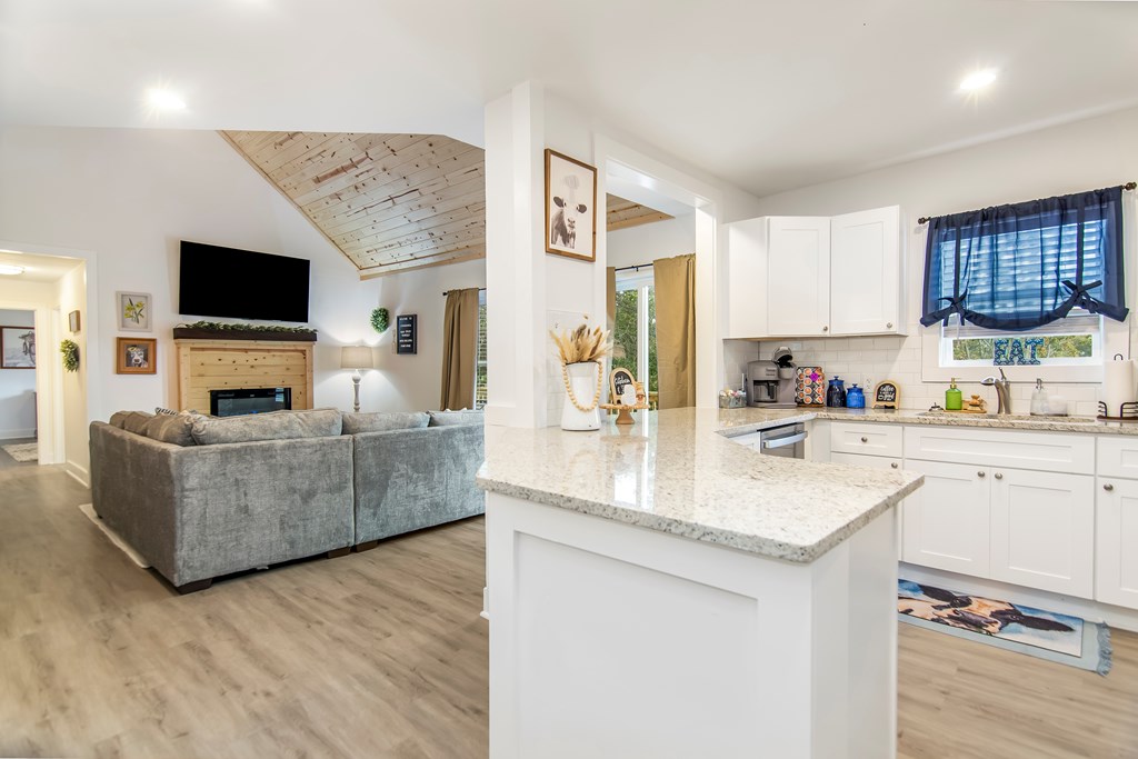 587 Oak Trace East Jasper, GA 30143 - Photo 19 of 47 a living room with furniture and a flat screen tv