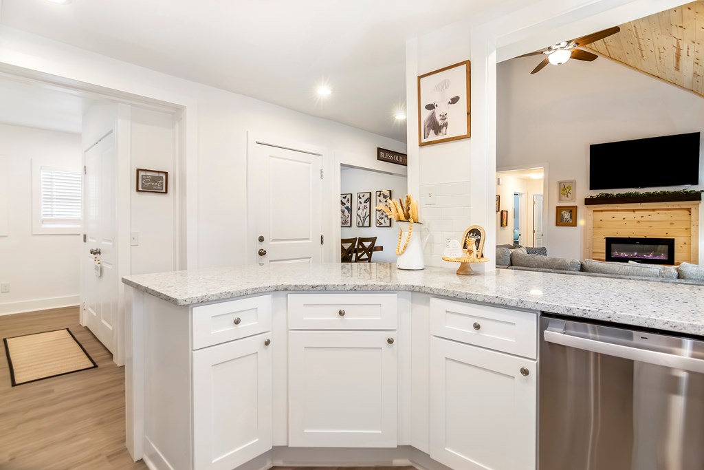 587 Oak Trace East Jasper, GA 30143 - Photo 22 of 47 a spacious bathroom with a granite countertop sink and a mirror