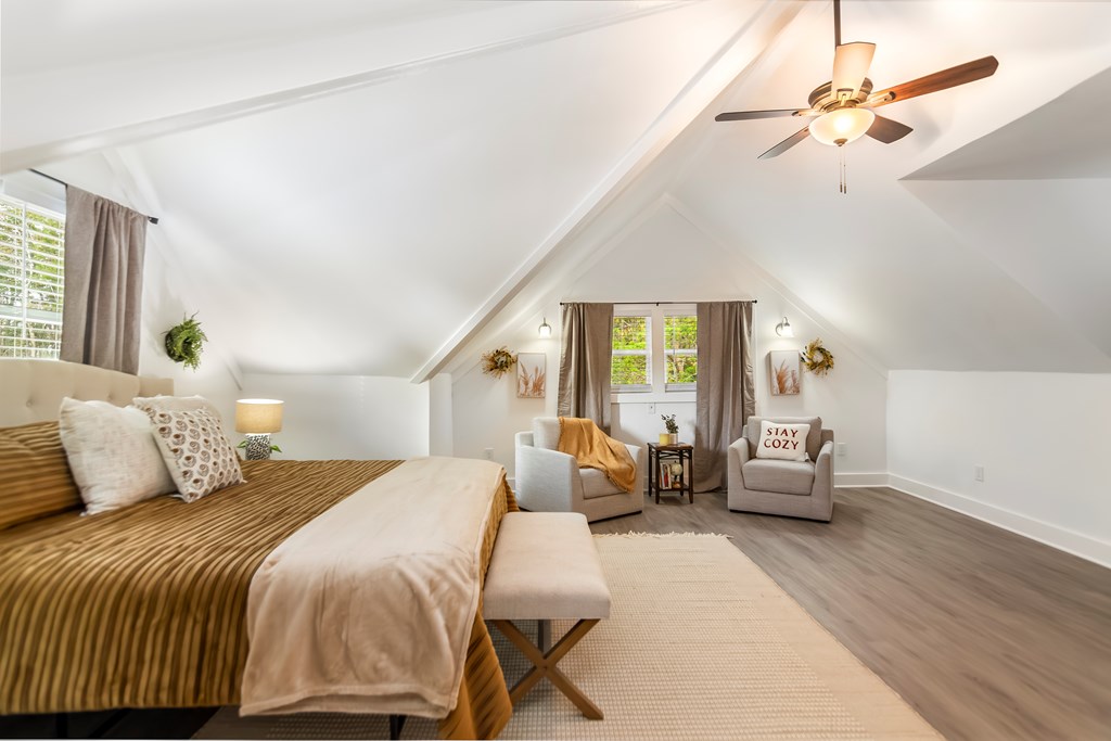 587 Oak Trace East Jasper, GA 30143 - Photo 31 of 47 a bedroom with a bed couch and window