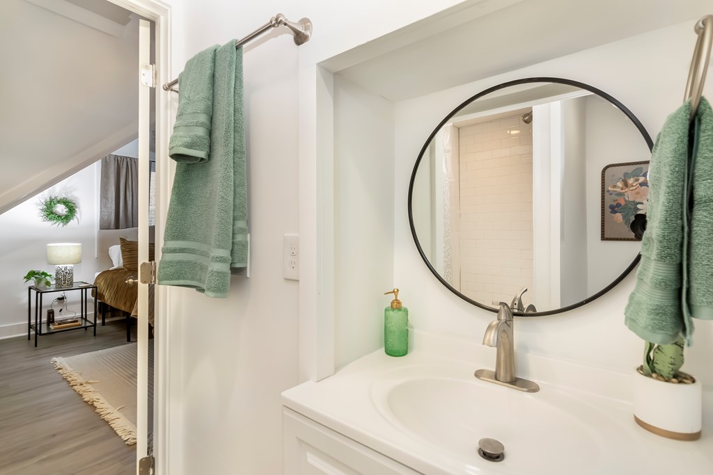 587 Oak Trace East Jasper, GA 30143 - Photo 32 of 47 a bathroom with a sink and mirror