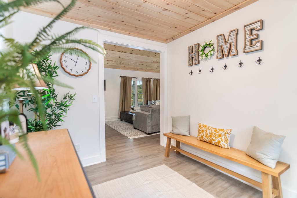 587 Oak Trace East Jasper, GA 30143 - Photo 4 of 47 a living room with furniture and a wall painting
