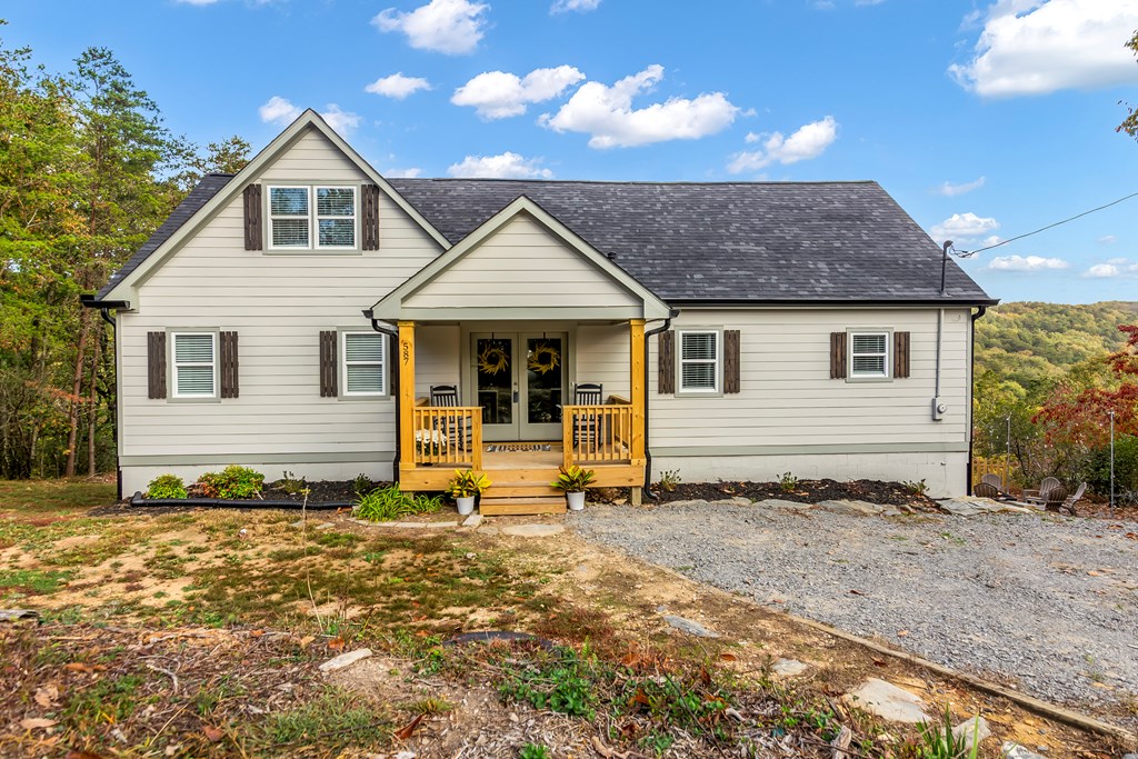 587 Oak Trace East Jasper, GA 30143 - Photo 41 of 47 a front view of a house with garden
