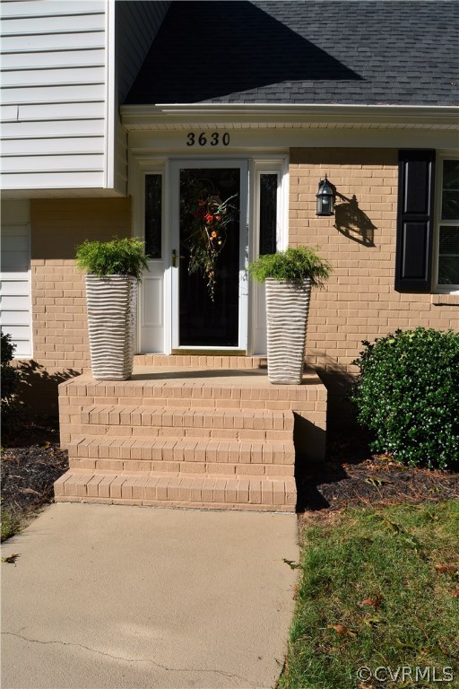 3630 Hemlock Road Chester, VA 23831 - Photo 5 of 43 a front view of a house with potted plants