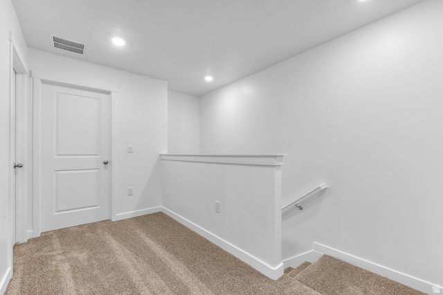 1851 East Corriente Drive, Unit 1166 Salem, UT 84653 - Photo 10 of 16 Hall featuring an upstairs landing, light carpet, and recessed lighting