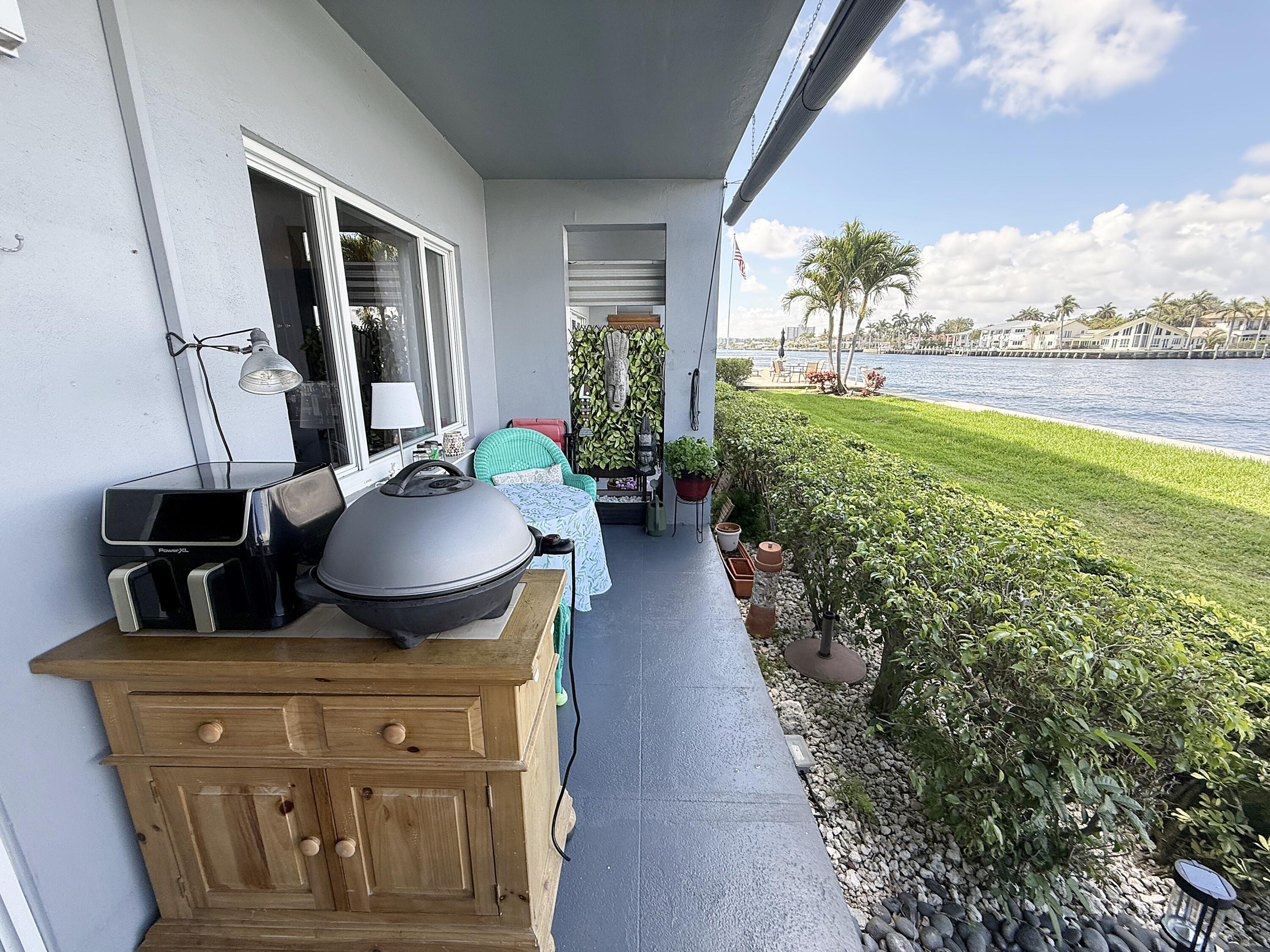 1201 South Riverside Drive, Unit 106 Pompano Beach, FL 33062 - Photo 11 of 28 a view of outdoor space patio and swimming pool