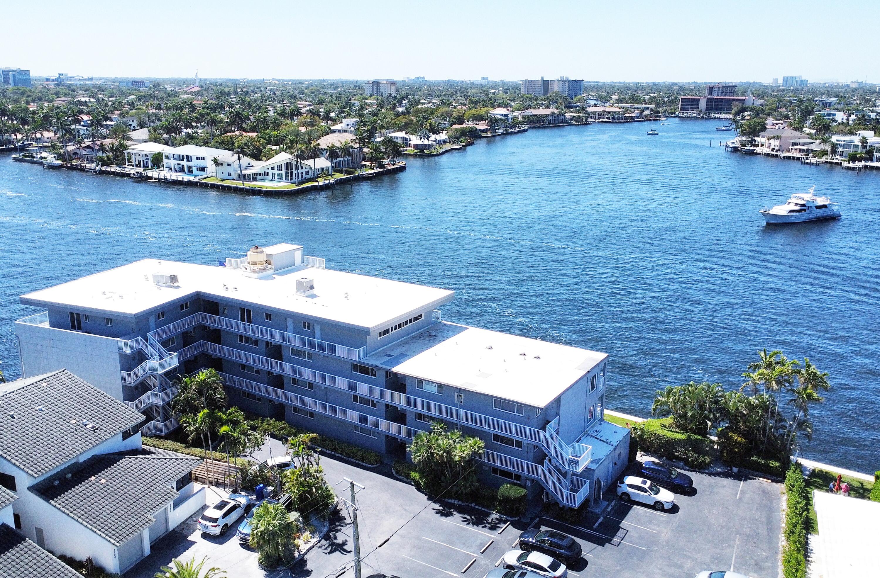 1201 South Riverside Drive, Unit 106 Pompano Beach, FL 33062 - Photo 16 of 28 an aerial view of a house with a lake view